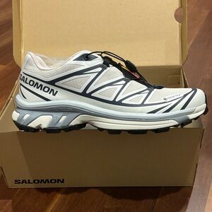 NEW with tags. Salomon White and Black Athletic Shoes (women’s 8)
